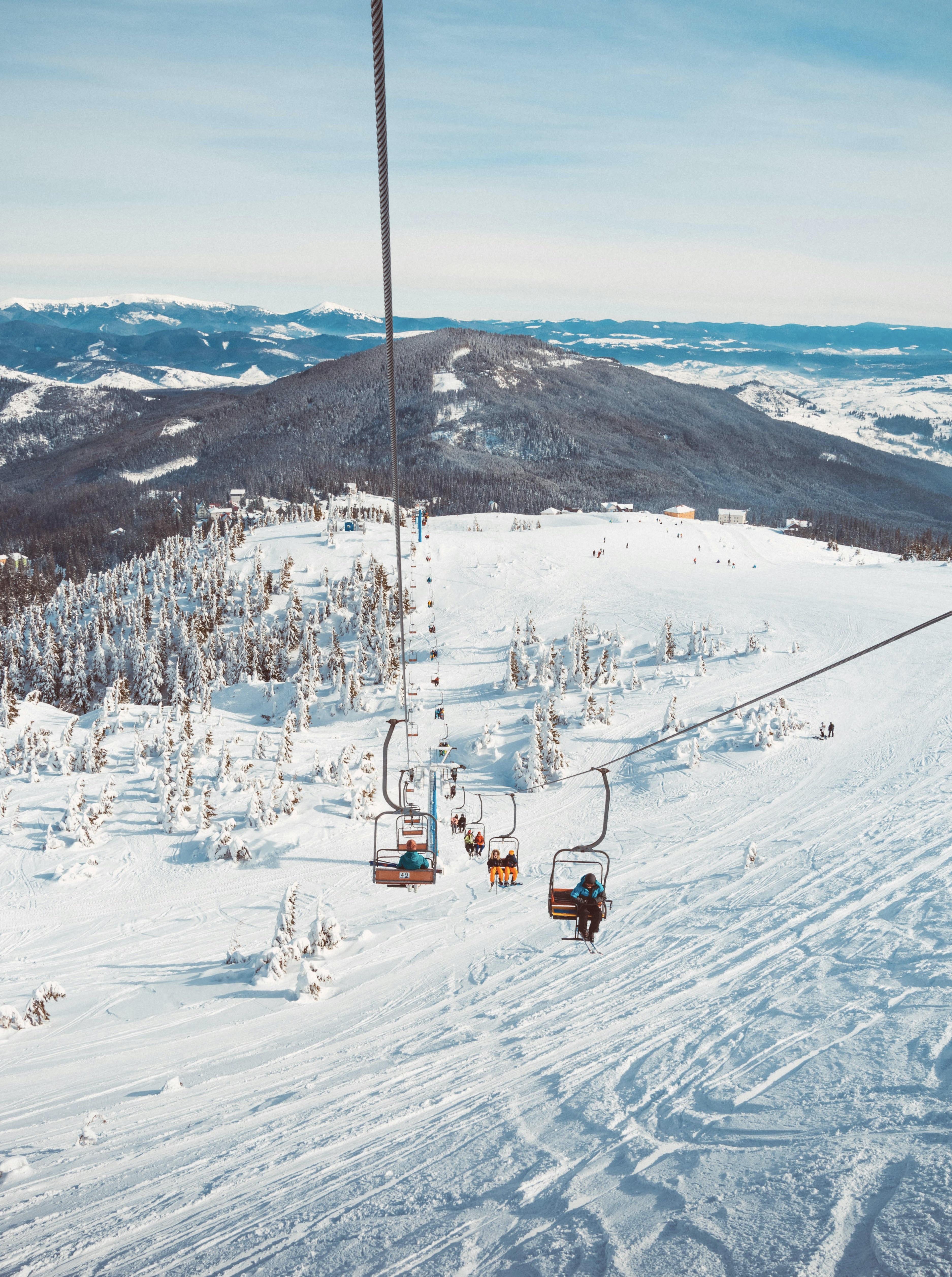 Snowy mountain view from a cable car